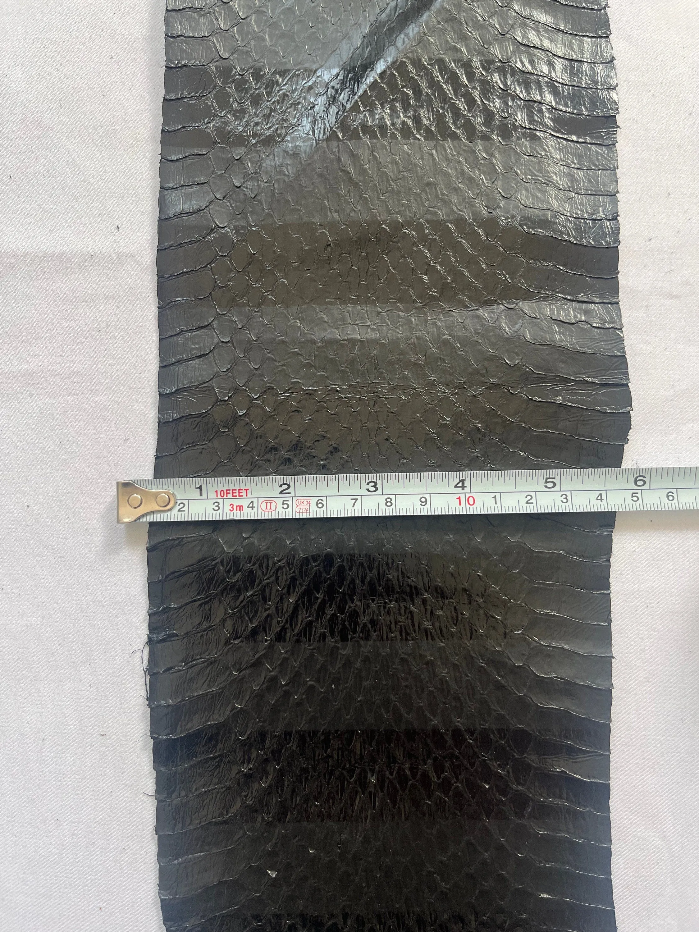 Genuine snake leather hide color black, thin and glossy, thickness 0,3mm(1 oz)