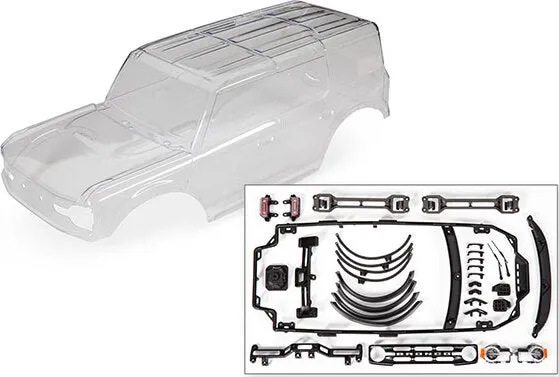 Traxxas Body, Ford Bronco (2021) (clear, requires painting)/ decals/ window masks (includes grille, side mirrors, door handles, fender flares, windshield wipers, spare tire mount, clipless mounting, hardware) (requires #8080X inner fenders) 9211